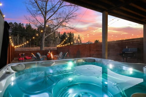 Let the sunset paint the sky while the hot tub melts the stress away.
