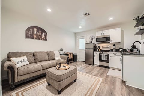 Open living room and kitchen area perfect for relaxing together.