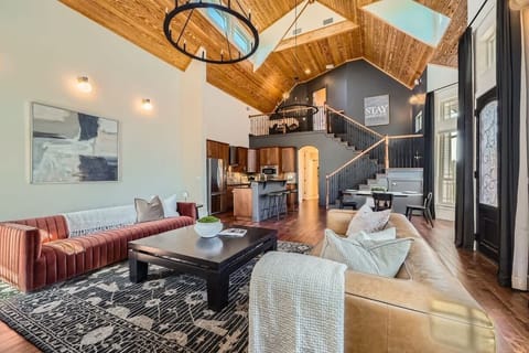 Kick back in a cozy living room with plenty of seating for everyone.