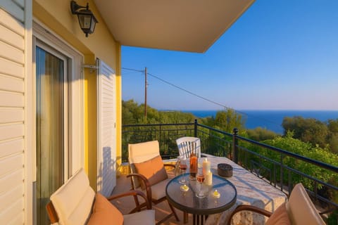 Balcony with Open Sea View and Cozy Seating
Enjoy unobstructed views of the Ionian Sea from this peaceful balcony retreat.
