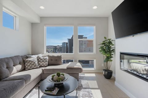 Living room with fireplace & smart TV