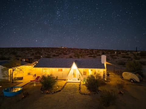 A glowing desmake all of the captions shorter2:05 PMClaude responded: Glowing cottage, vintage trailer, sky full of stars.Glowing cottage, vintage trailer, sky full of stars. Pure Joshua Tree magic. 🌟🌵ert cottage, a vintage trailer, and a sky absolutely p