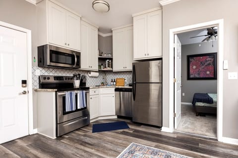 Whether it`s breakfast or dinner, our full kitchen is ready with stainless steel appliances — including a fridge/freezer, stove, oven, microwave, and dishwasher — so you can feel at home while you`re away.