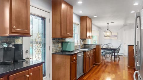 Exit to backyard through the kitchen.