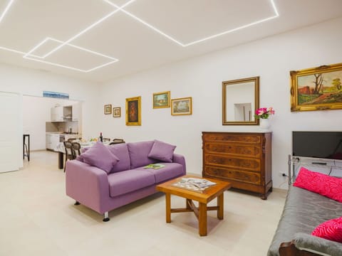 Furniture, Interior Design, Flooring, Wall, Floor, Ceiling, Wood, Room, Couch, Lighting