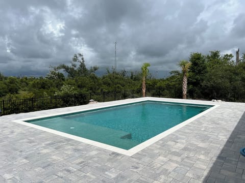 Pool with large sun shelf
