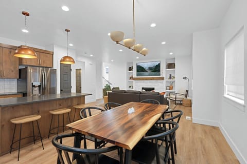 Open concept living, dining, and kitchen areas