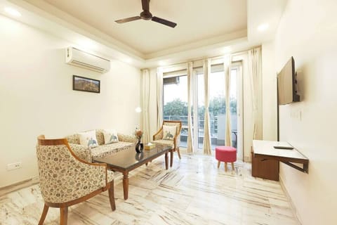 "Make yourself at home and relax in style - where comfort meets elegance, in the inviting space of your living room."
