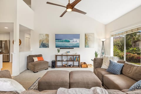 Living room right off kitchen and main lanai with large comfy sectional