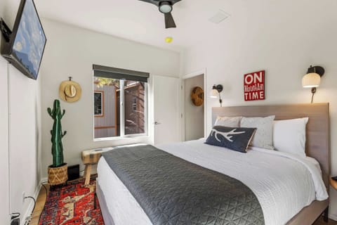 Queen bedroom upstairs with Smart TV