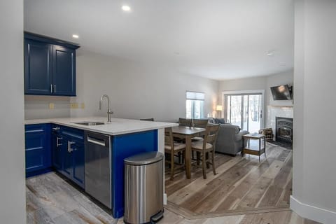 Kitchen, step down to dining  room(seats six) and living room & fireplace