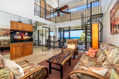 Experience island living at its best from this beautifully updated 2-bedroom plus loft, 2.5-bathroom condo perched on the top floor