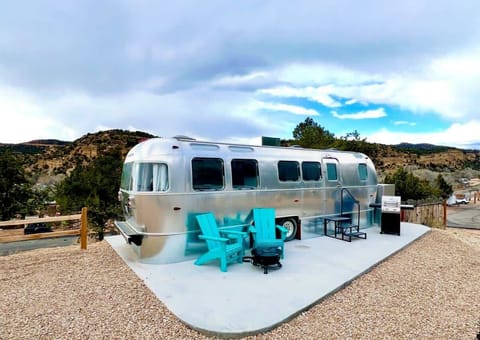 Airstream Landing at East Zion Resort is a cozy glamping basecamp near Zion National Park and Bryce Canyon, with private outdoor space for relaxing after a day of adventure.