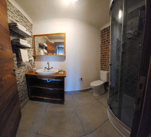 Economy Room, Balcony | Bathroom | Shower, hair dryer, slippers, towels