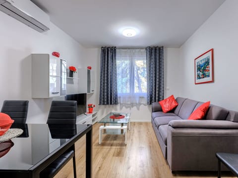 Furniture, Interior Design, Flooring, Floor, Couch, Room, Apartment, Home, Living Room, Table