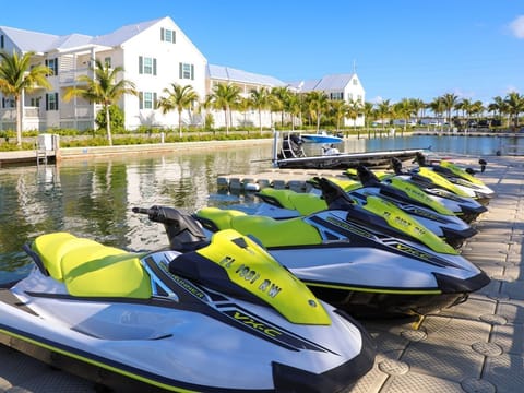 Exciting waterfront adventures await with jet skis ready for a day of thrills on the water.