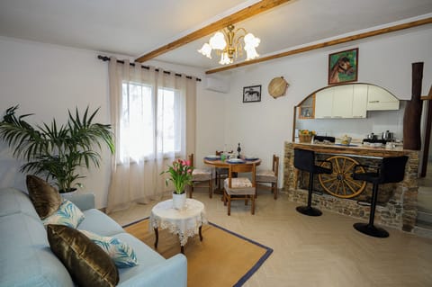 House, 2 Bedrooms | Living area | 32-inch flat-screen TV with digital channels