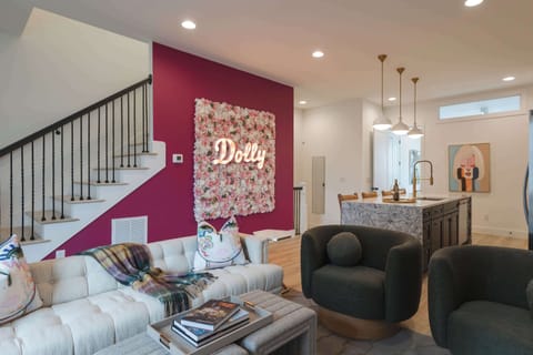 Large 4-story house with a comfortable, open living space located on the 2nd floor for groups and families to hang out, cook, eat, talk and create memories. 