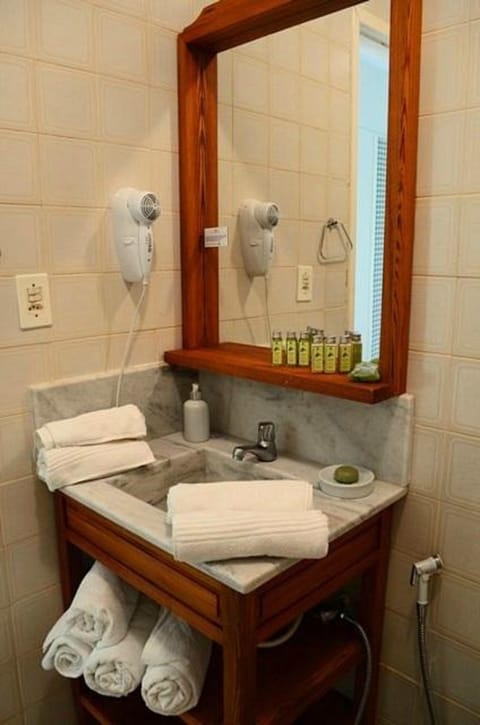 Hair dryer, bathrobes, slippers, towels