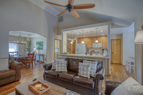 This open concept home sleeps 10 and has a lovely hot tub! Wilderness Cottage is  Pet friendly w/ a fenced backyard.