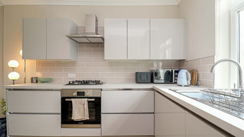 A fully equipped kitchen designed to make cooking easy and enjoyable, whether it’s a quick breakfast or a home-cooked meal.