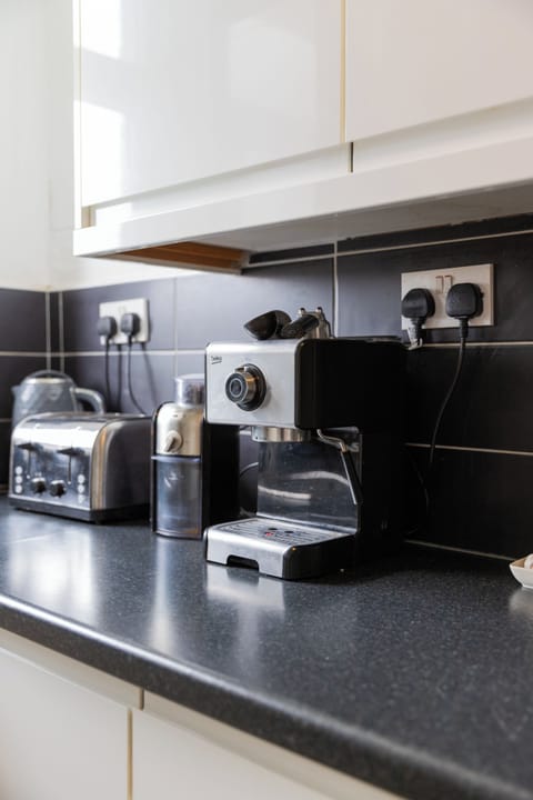 Modern appliances, elegant finishes, and a welcoming layout make this kitchen the heart of the home.
