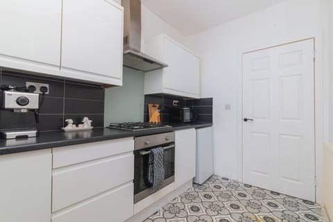 A stylish and functional kitchen perfect for family meals, entertaining friends, or enjoying quiet mornings.