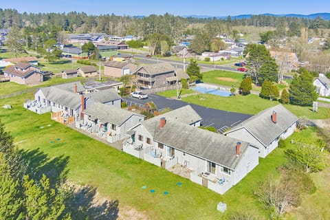 Rear view of the cottages with access to outdoor spaces.