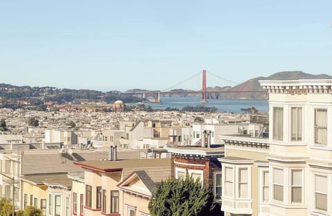 This charming home offers breathtaking views of the iconic Golden Gate Bridge, framed by the city's classic architecture.