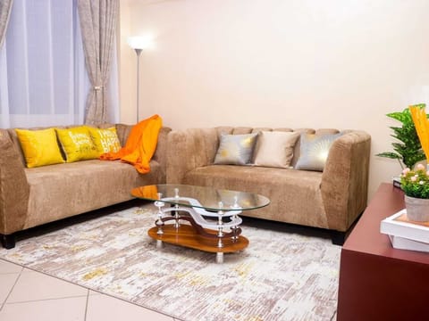 Deluxe Apartment, City View | Living area | 32-inch Smart TV with digital channels