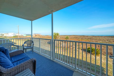 Outdoor seating on the private balcony.