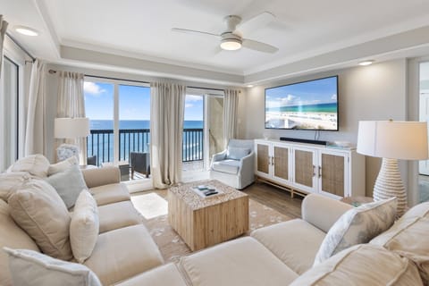 Relax in this bright living space where stunning ocean views and plush seating create your perfect seaside retreat.