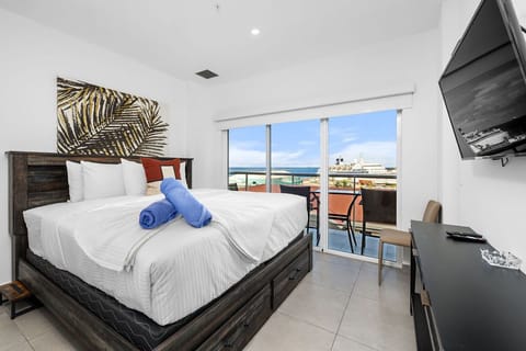 Wake to ocean views from your plush bed. Step onto your private balcony with coffee and let the sea breeze refresh you as the day begins.