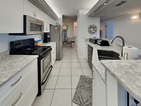 Fully Equipped Kitchen with Stainless Steel Appliances