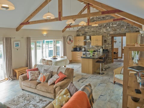 Open plan living area with French windows