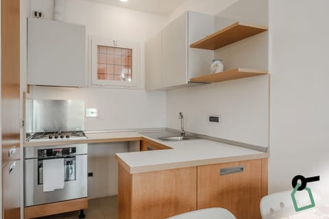Apartment, Balcony | Private kitchenette | Fridge, stovetop, cookware/dishes/utensils