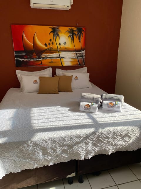Comfort Room | Blackout drapes, iron/ironing board, bed sheets
