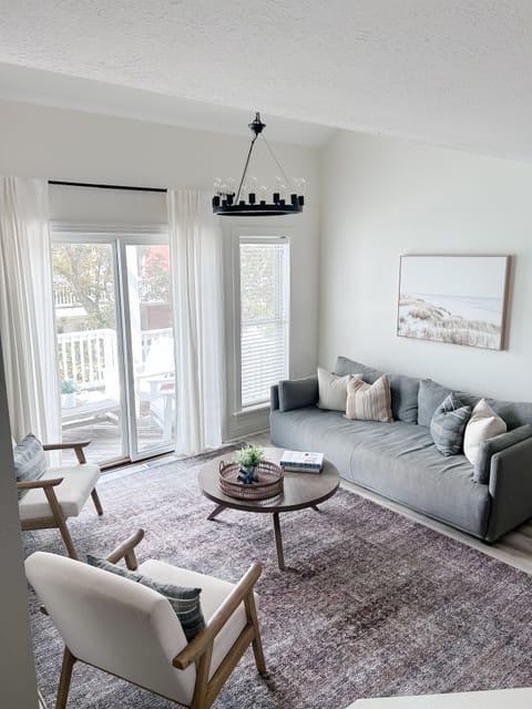 Relax in this airy, coastal inspired living room, perfect for a morning coffee