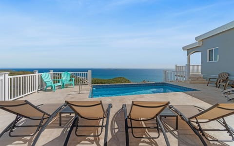 Another view of the pool area showing ample seating and privacy.