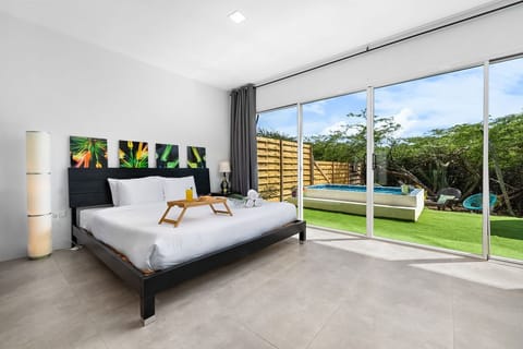 Experience a restful night's sleep in our king-size bed, with a picturesque pool view to greet you each morning.