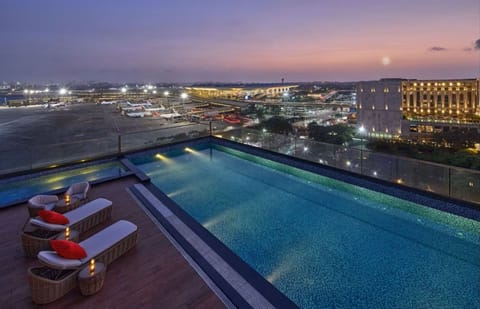 2 outdoor pools, lifeguards on site