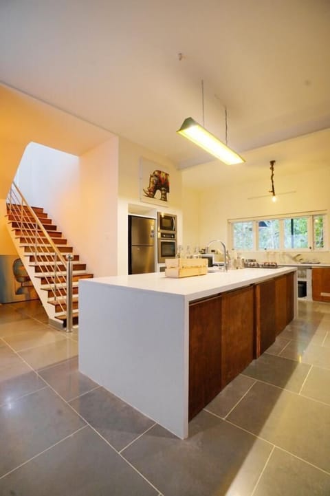 Family Villa, Balcony, River View | Shared kitchen facilities | Shared fridge, microwave