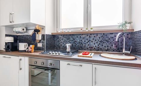 Kitchen, Countertop, Interior Design, Flooring, Plumbing Fixture, Tap, Sink, Tile, Kitchen Sink, Kitchen Appliance