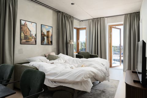 Apartment, 2 Bedrooms | Living area | 43-inch TV with digital channels