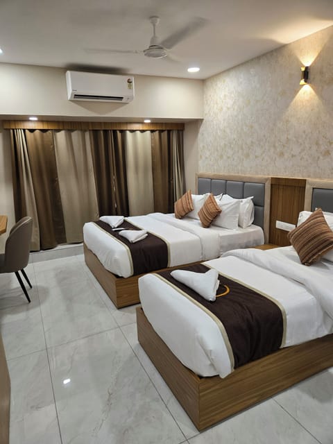 Superior Triple Room | Premium bedding, pillowtop beds, desk, blackout drapes