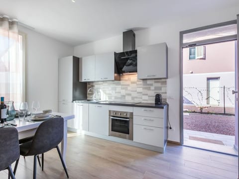 Interior Design, Furniture, Flooring, Ceiling, Floor, Major Appliance, Kitchen, Countertop, Home, Room