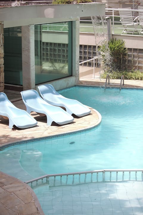 Outdoor pool, pool umbrellas, sun loungers