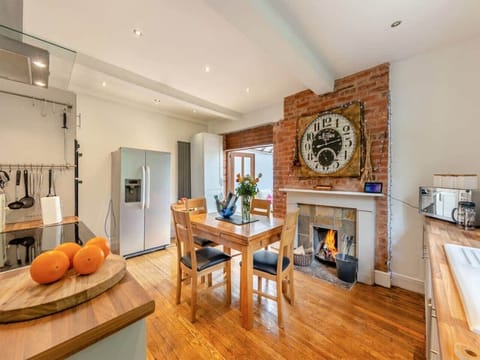 Cozy dining nook with fireplace and stylish decor