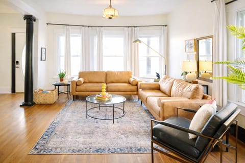 Large living room with comfy couches
