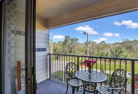 Step outside to enjoy the fresh air from the balcony.